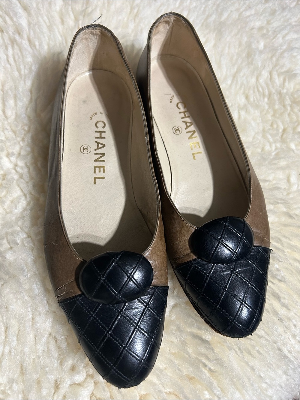 CHANEL Brown and Black Quilted Leather Pointed Toe Flats - side leather cracked
